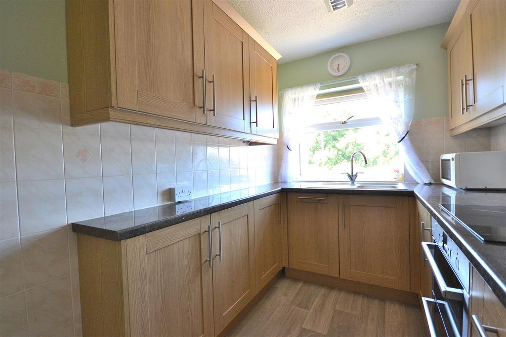 Property photo 3 of 12 Kitchen