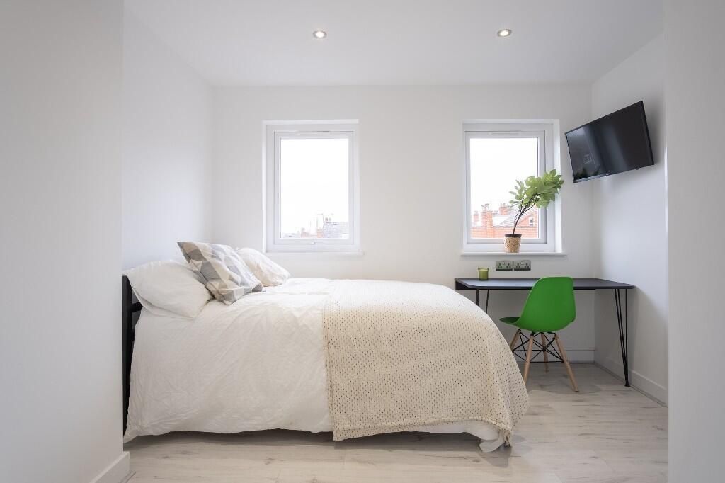 Property photo 1 of 15 Bright And Airy Bedroom Featuring Two Clean Window...
