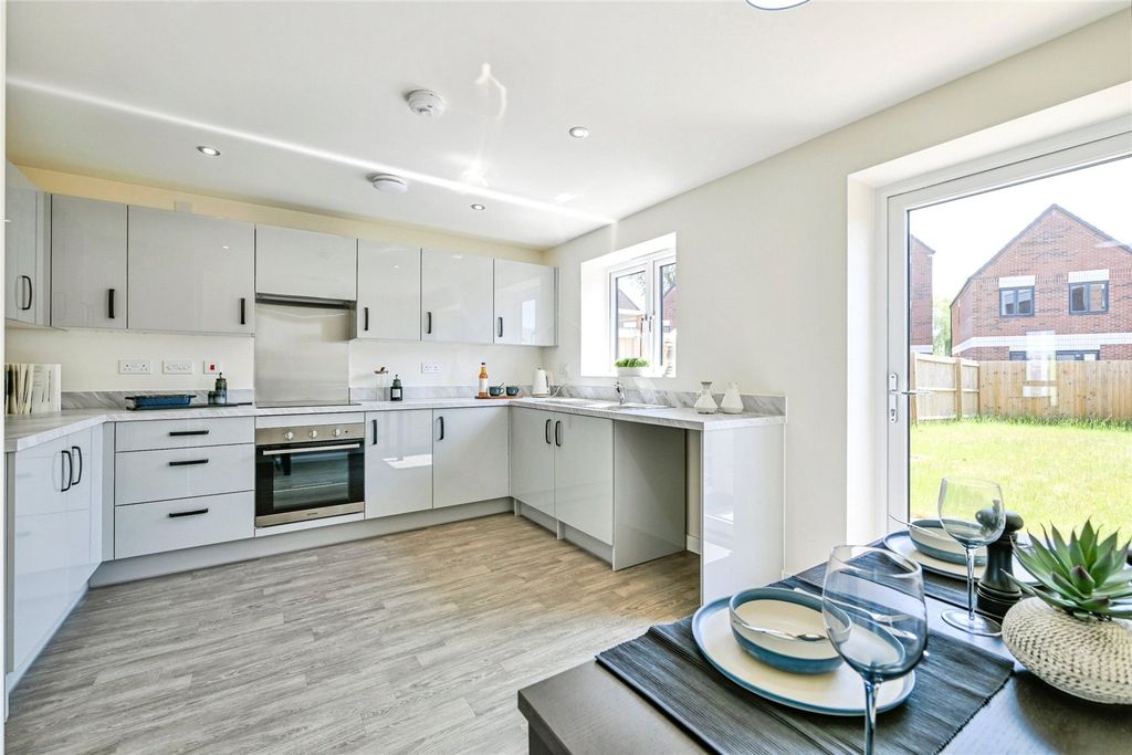 Property photo 3 of 10 Typical Kitchen