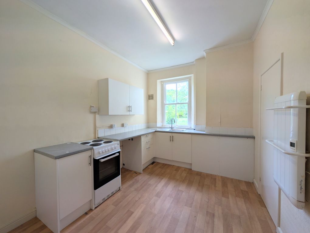 Property photo 3 of 7 Kitchen
