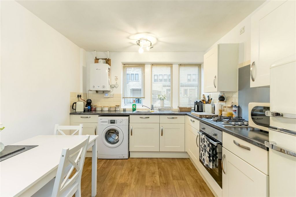Property photo 3 of 17 Dining Kitchen