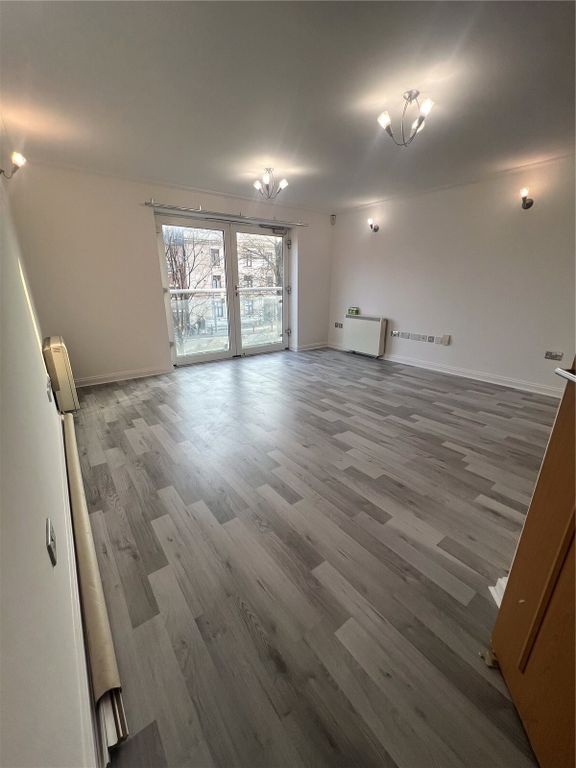 Property photo 3 of 10 Living/Dining Area