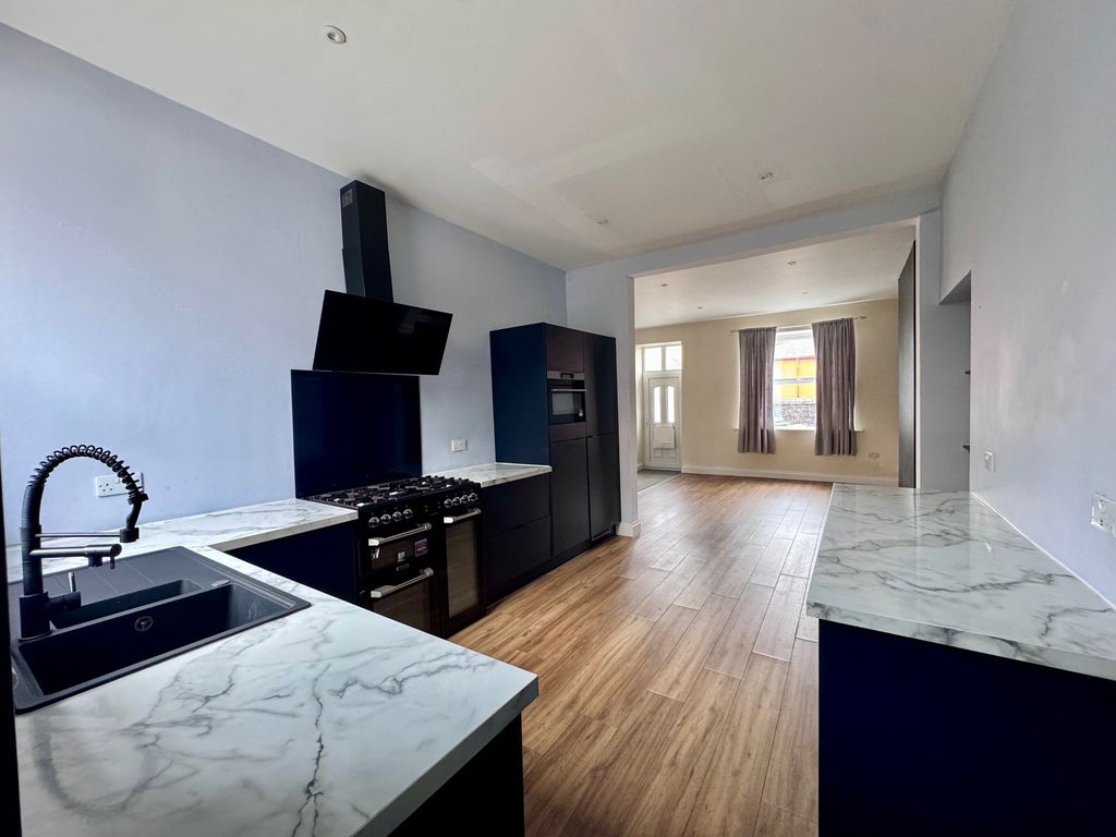 Property photo 3 of 17 Kitchen To Dining Area