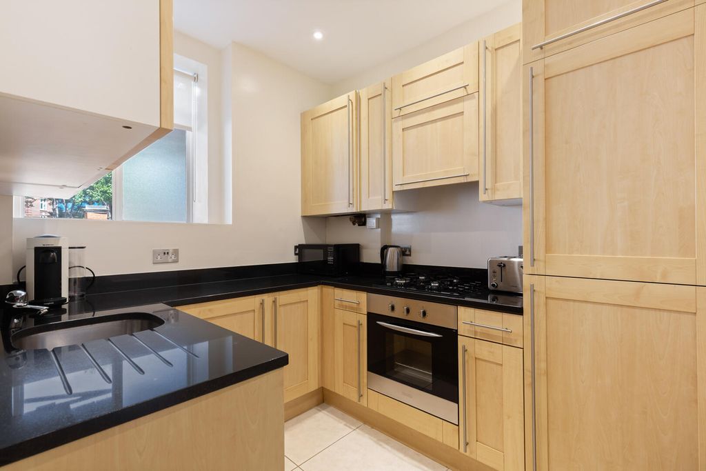 Property photo 3 of 8 Kitchen