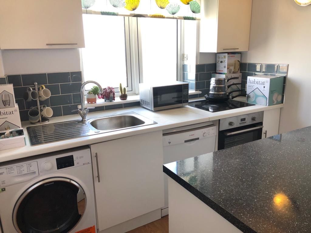 Property photo 2 of 12 Kitchen