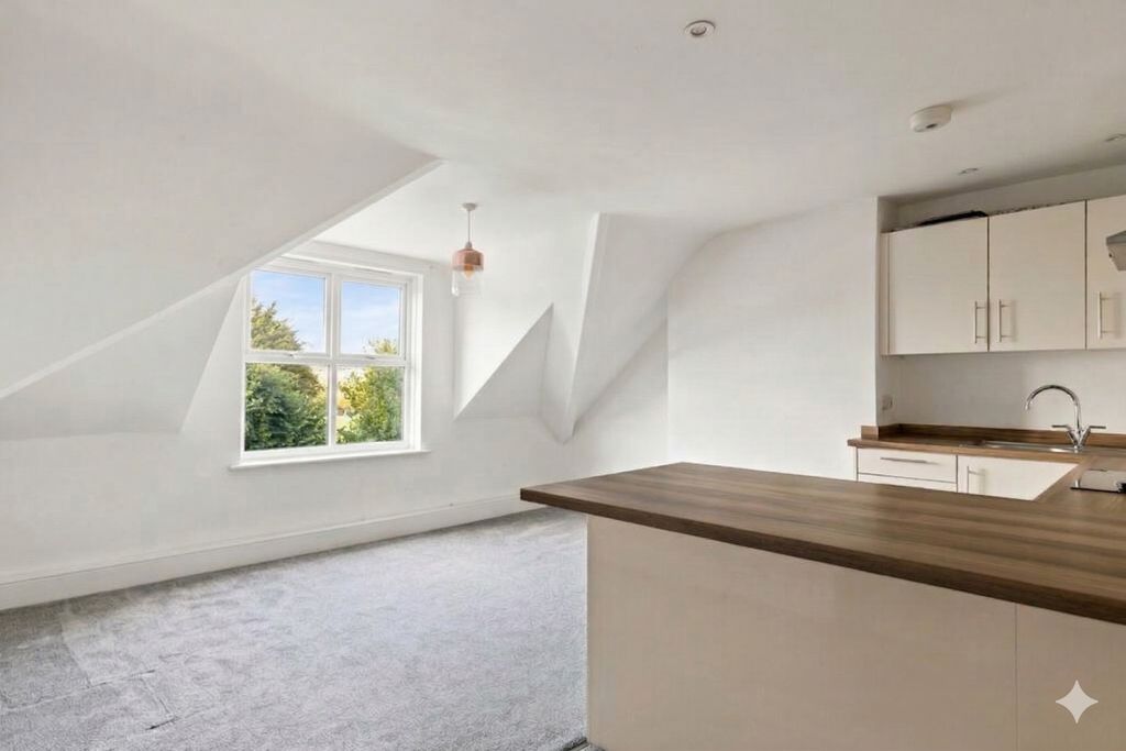 Property photo 3 of 7 Kitchen Living