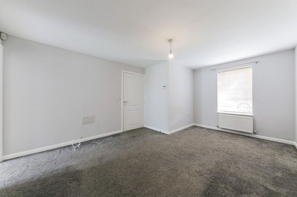 Property photo 3 of 12 Living Room