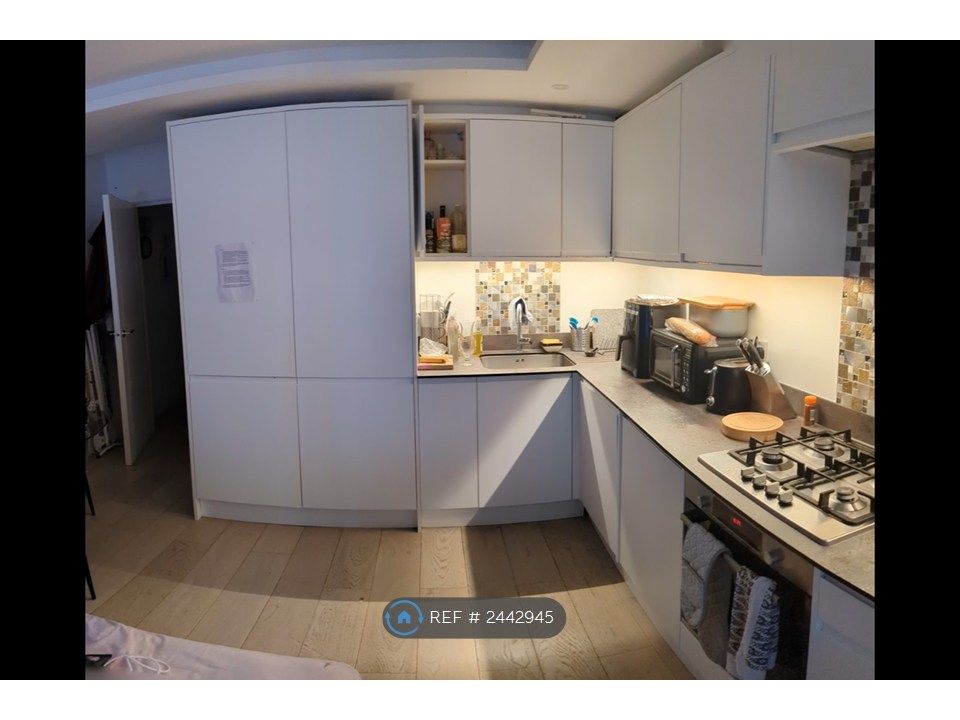 Property photo 1 of 9 Kitchen Area