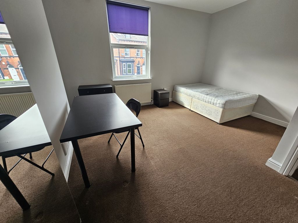 Property photo 1 of 15 A Bright And Tidy Bedroom Featuring A Single Bed, ...