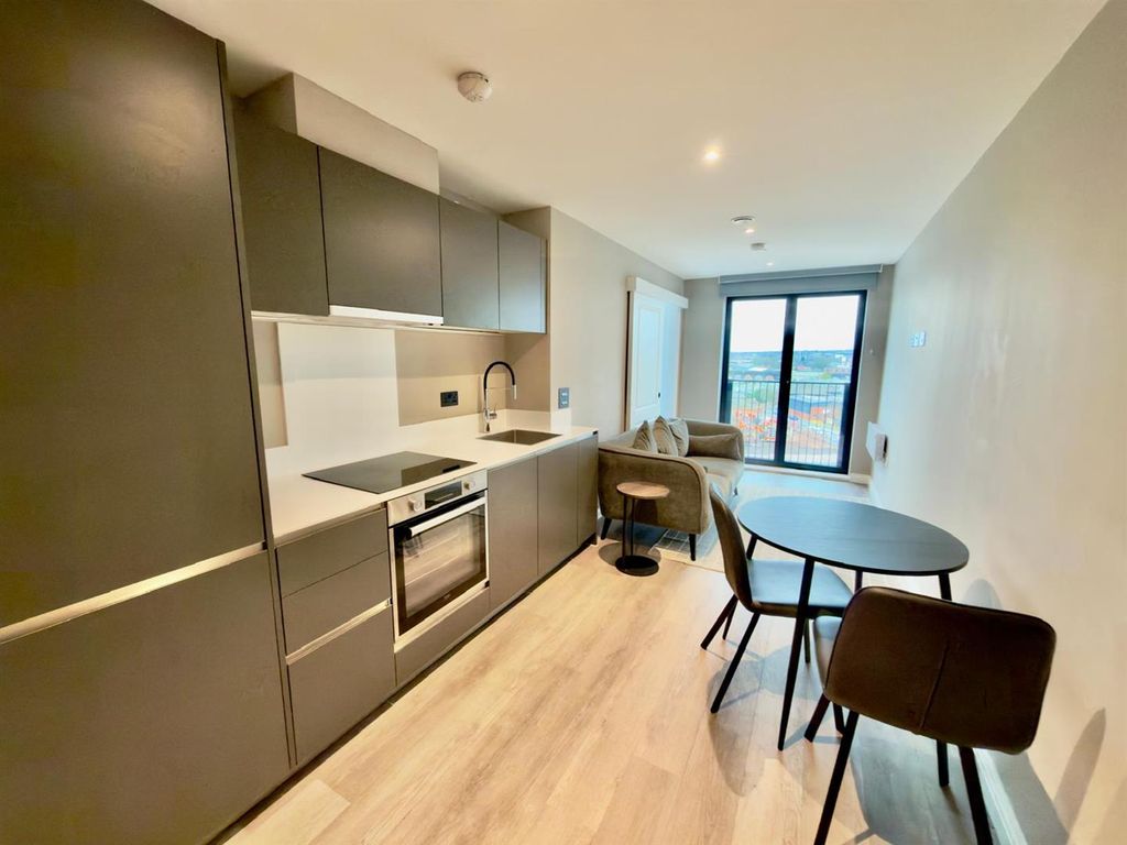 Property photo 3 of 16 Kitchen Area