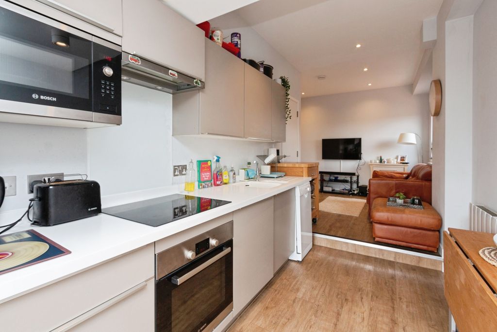 Property photo 2 of 13 Living Area