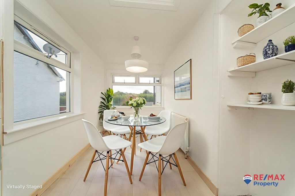 Property photo 3 of 19 Virtually Staged Dining Area