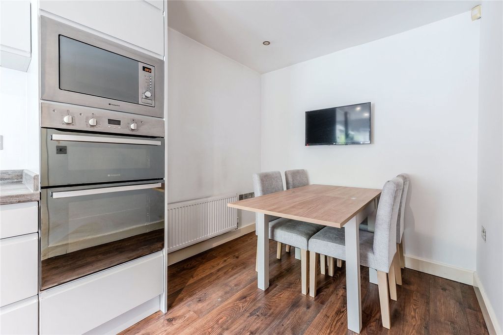 Property photo 3 of 17 Dining Kitchen