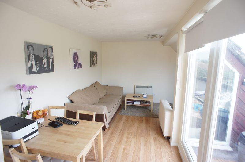 Property photo 3 of 8 Living Room