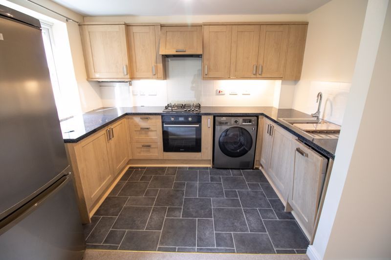 Property photo 3 of 8 Kitchen