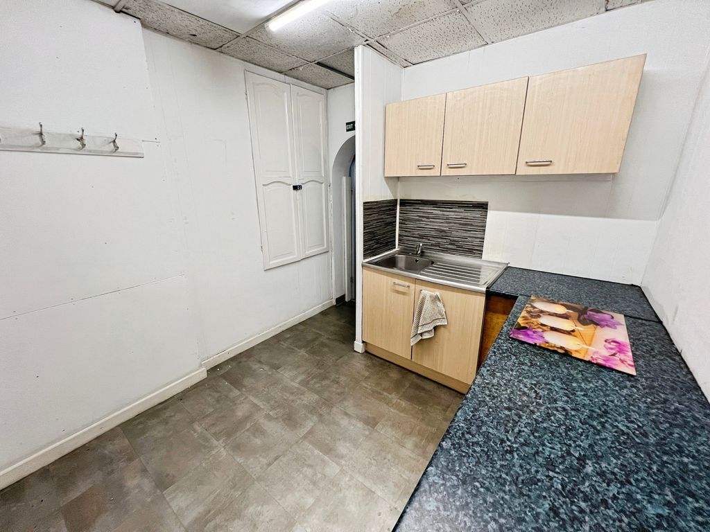 Property photo 3 of 9 Kitchen Area