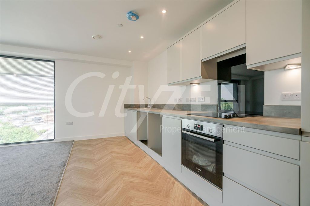 Property photo 3 of 13 Kitchen