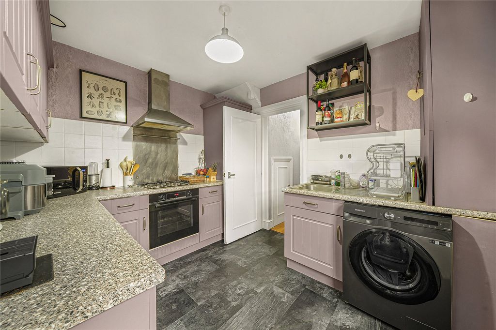 Property photo 3 of 16 Kitchen