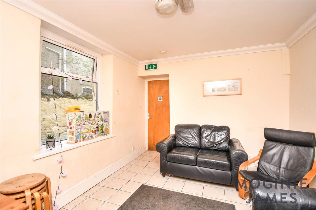 Property photo 2 of 16 Living Area