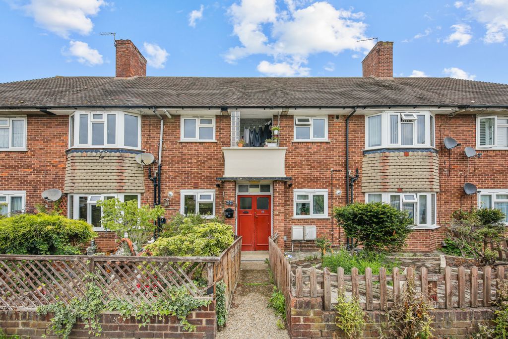 Property photo 1 of 34 Attractive Red-Brick Façade On A Quiet Residential Street With Charming Kerb Appeal.