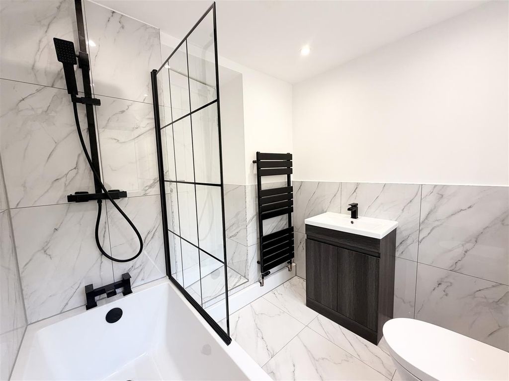 Property photo 1 of 26 Modern Marble-Effect Bathroom With Sleek Fixtures...