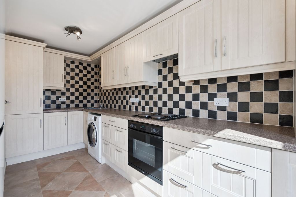 Property photo 2 of 12 Kitchen