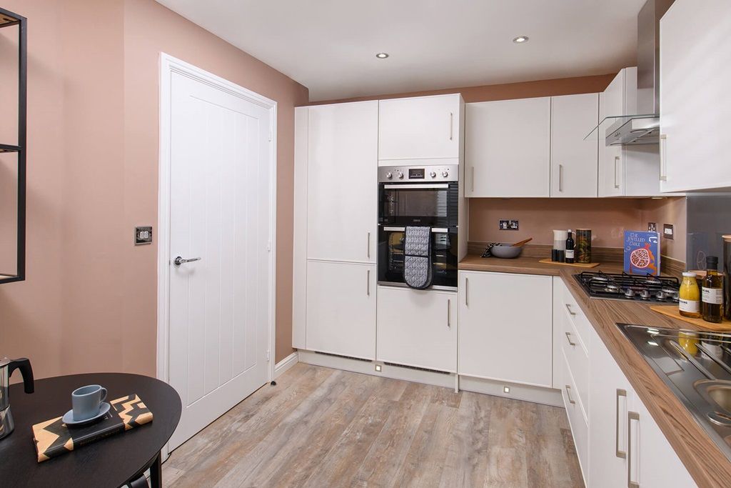 Property photo 3 of 9 Stylish Kitchen With Ample Storage