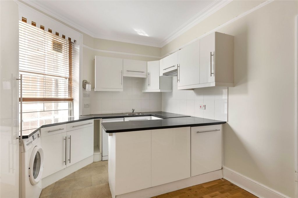 Property photo 3 of 8 Kitchen