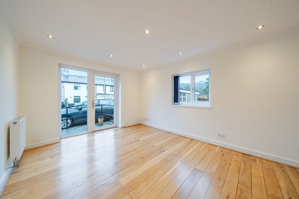 Property photo 3 of 12 Living Area