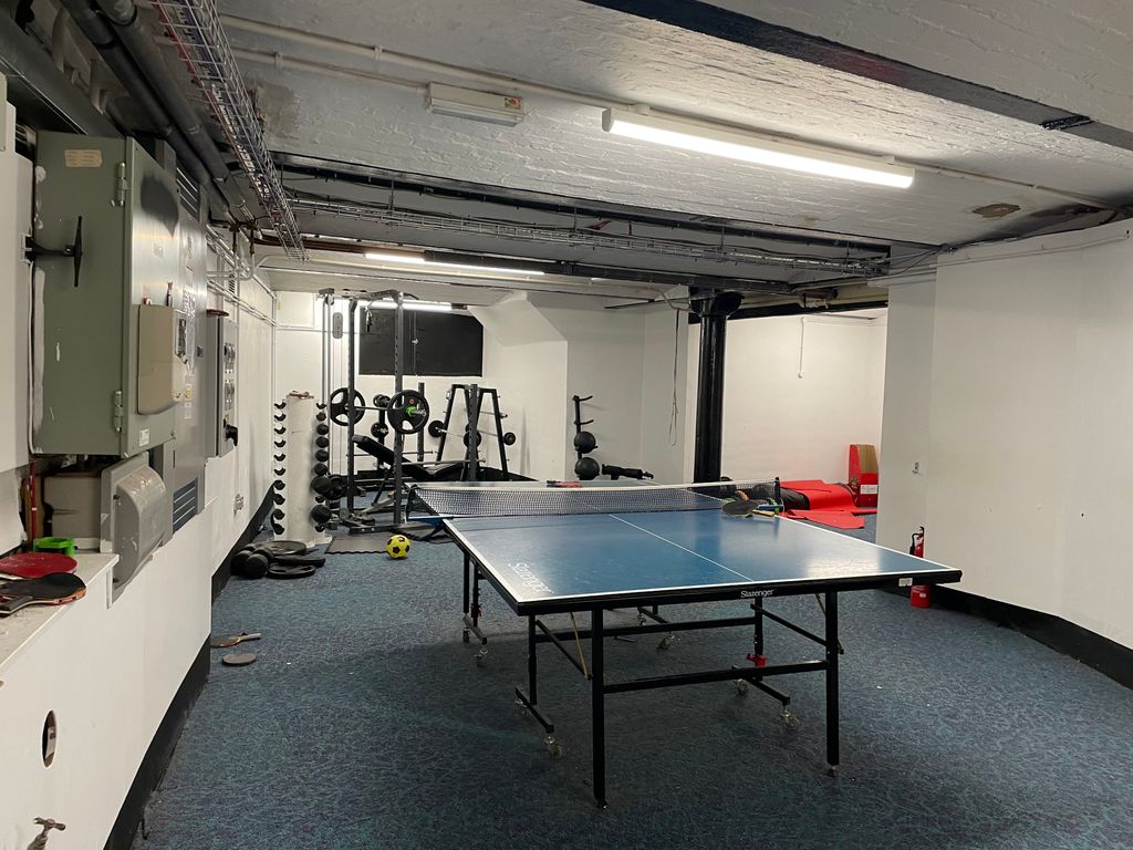 Property photo 3 of 14 Basement Gym Area