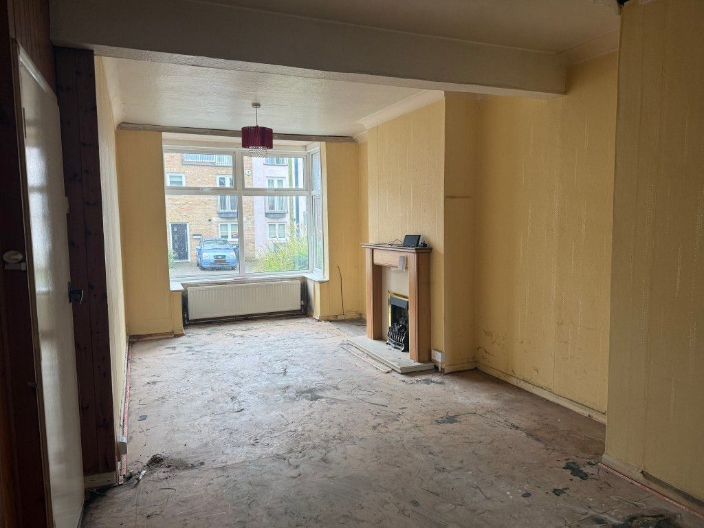 Property photo 3 of 13 Living Room In House In Need Of Improvement