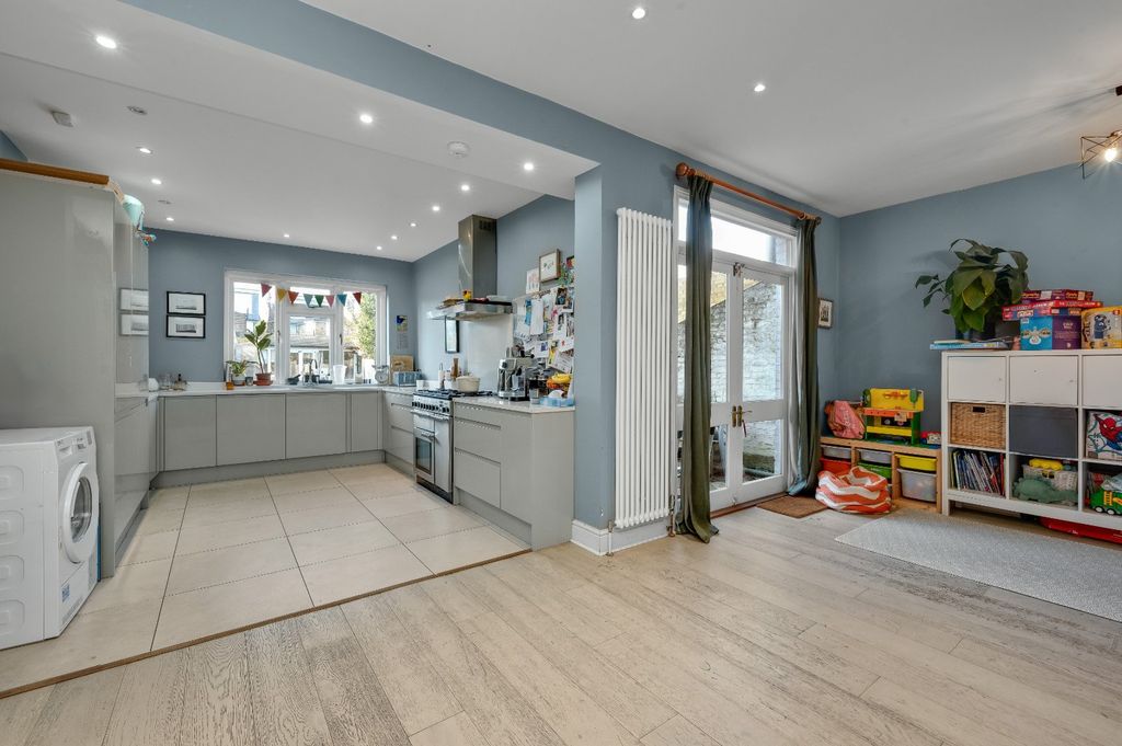 Property photo 3 of 13 Kitchen/Dining/Fam