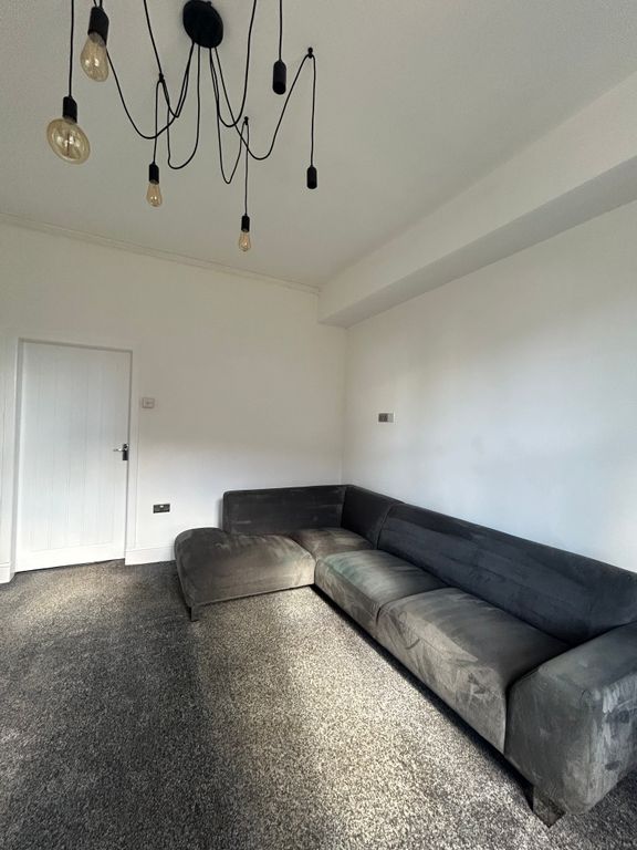 Property photo 3 of 8 Living Room -