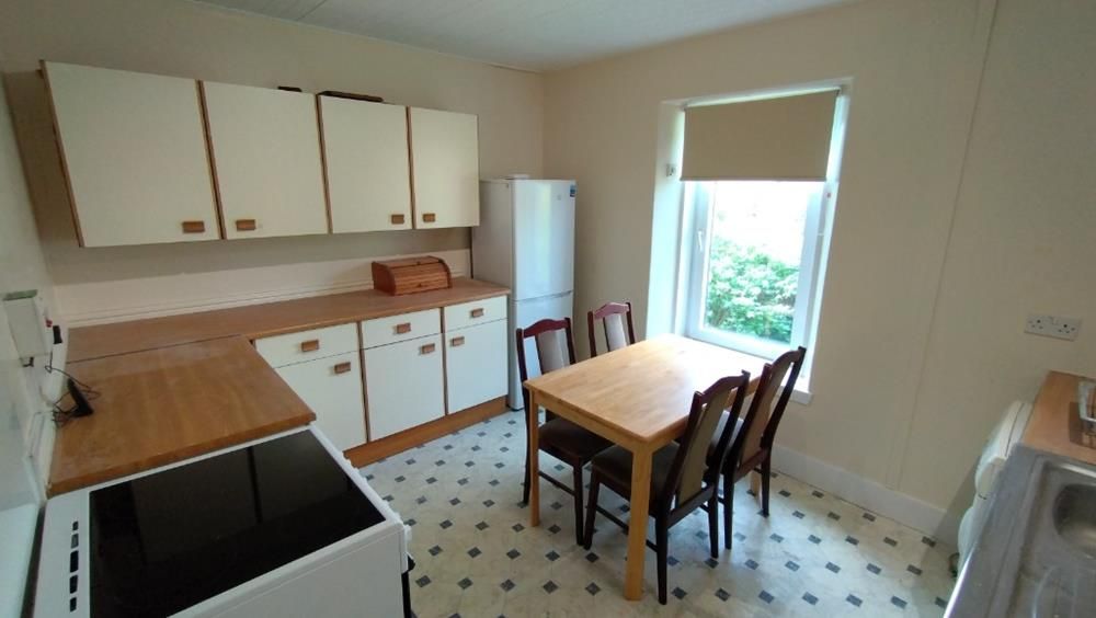 Property photo 3 of 7 Kitchen