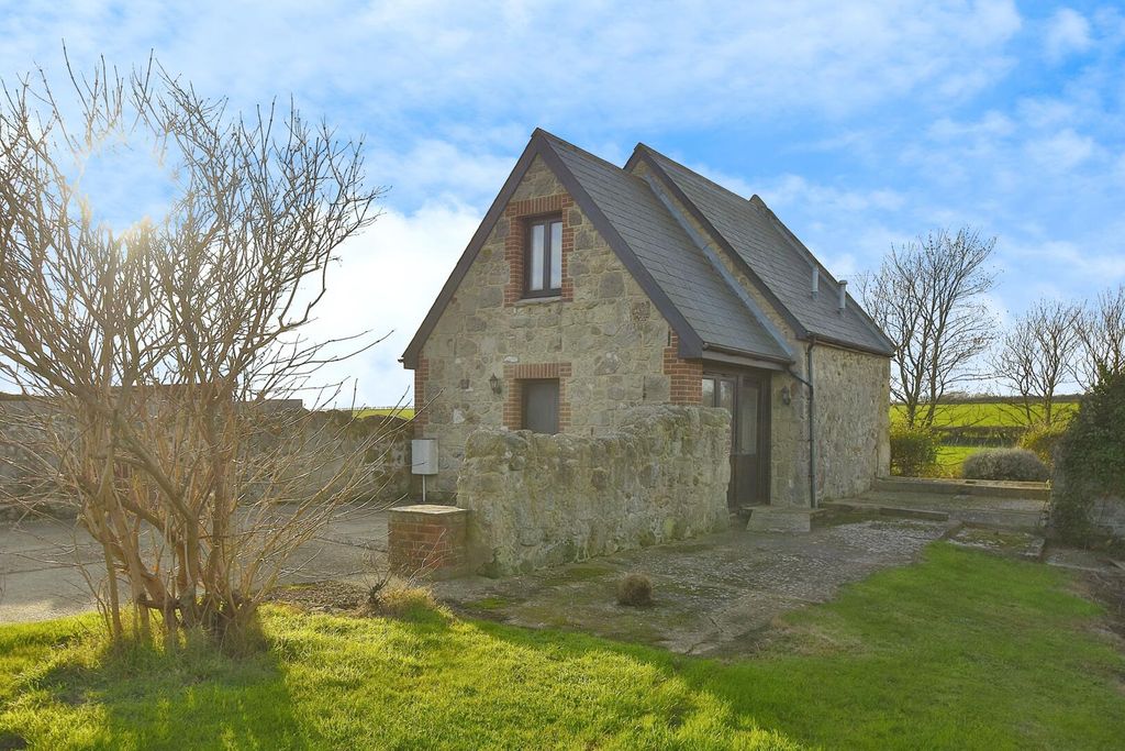 Property photo 1 of 15 Front (Exterior)