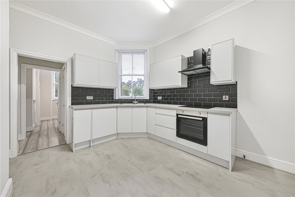 Property photo 3 of 9 Kitchen