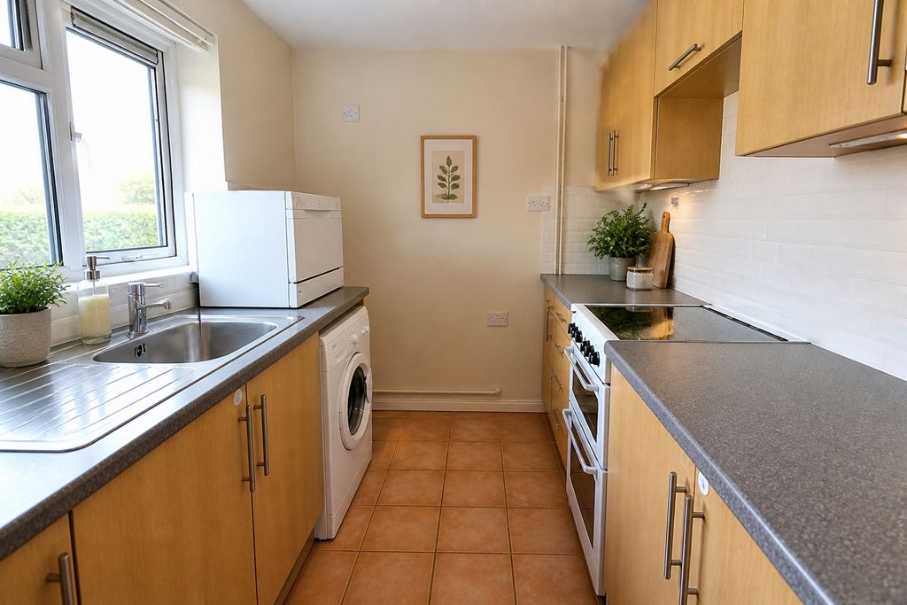 Property photo 3 of 9 Kitchen