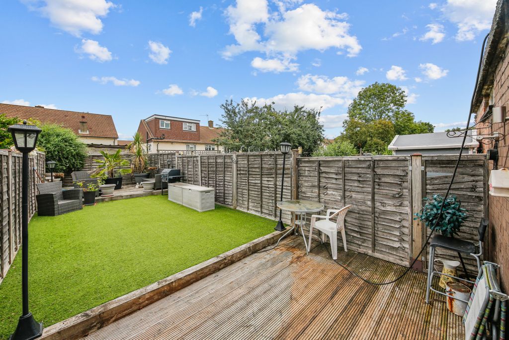 Property photo 2 of 34 Generous Private Garden With Raised Decking And Low-Maintenance Artificial Lawn.