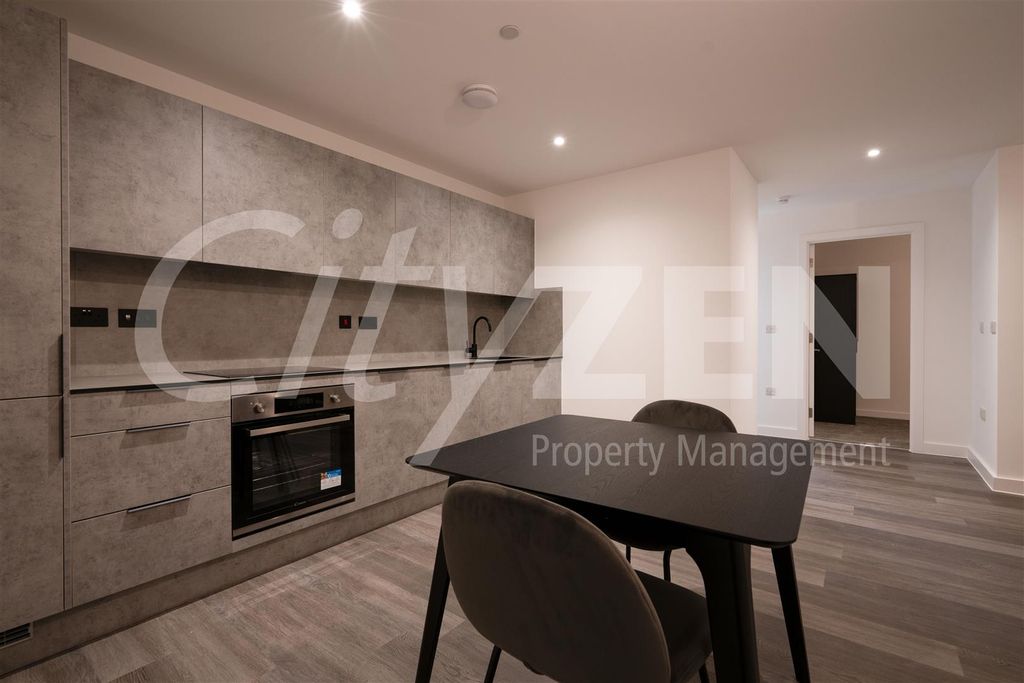 Property photo 3 of 11 Dining Area/Kitchen