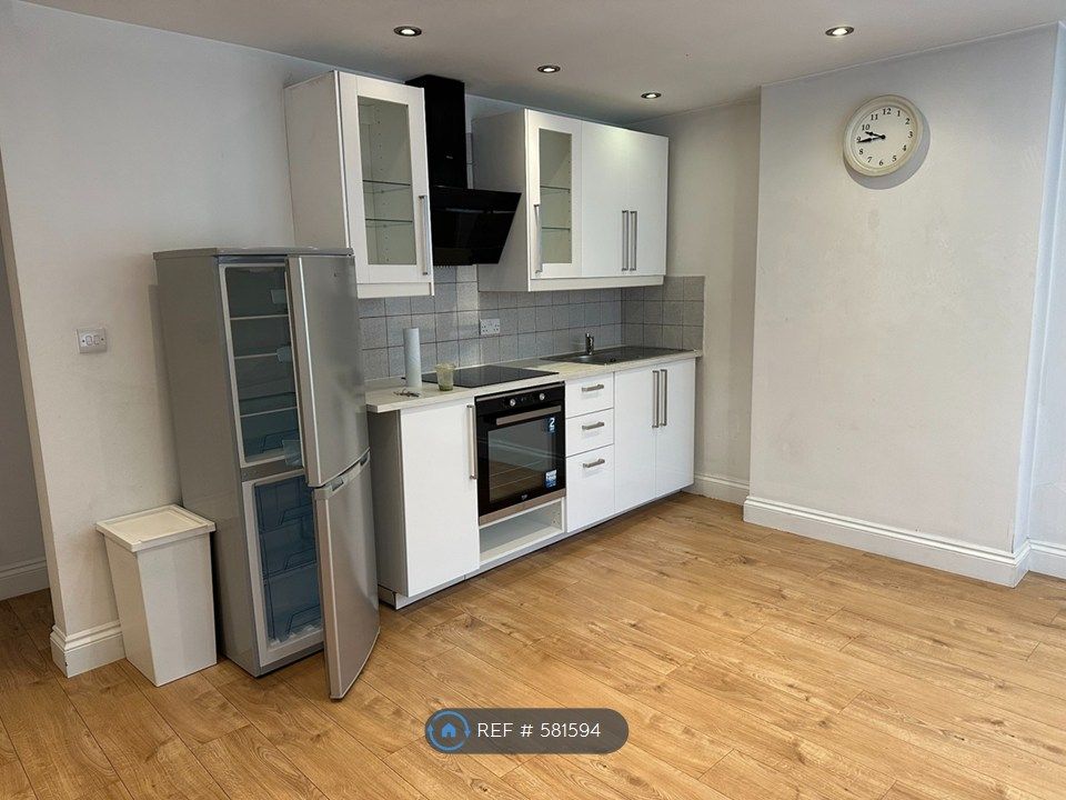 Property photo 2 of 8 Kitchen And Living Area