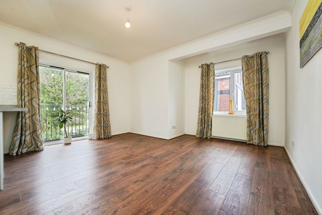 Property photo 3 of 12 Living Area