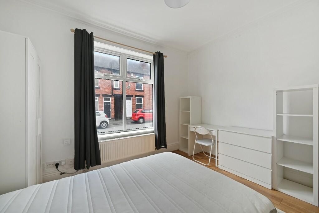 Property photo 3 of 13 Bright And Airy Double Bedroom Featuring A Large W...