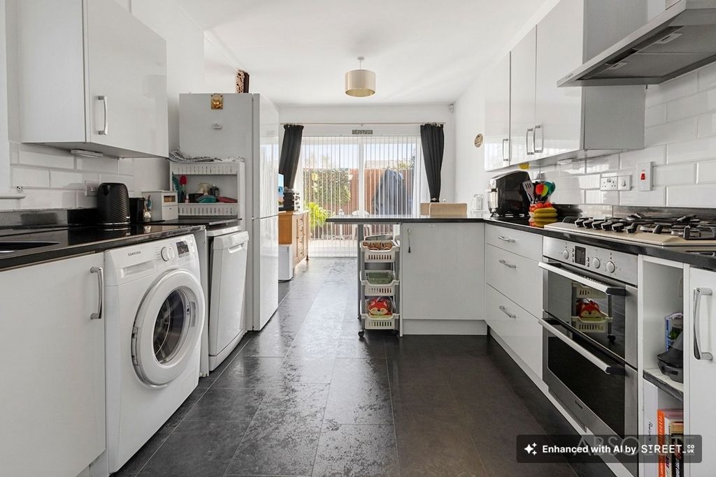 Property photo 2 of 21 Kitchen Area