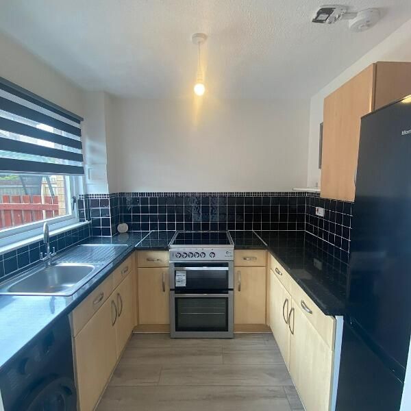 Property photo 3 of 12 Kitchen