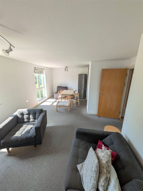 Property photo 2 of 12 Living/Dining Area