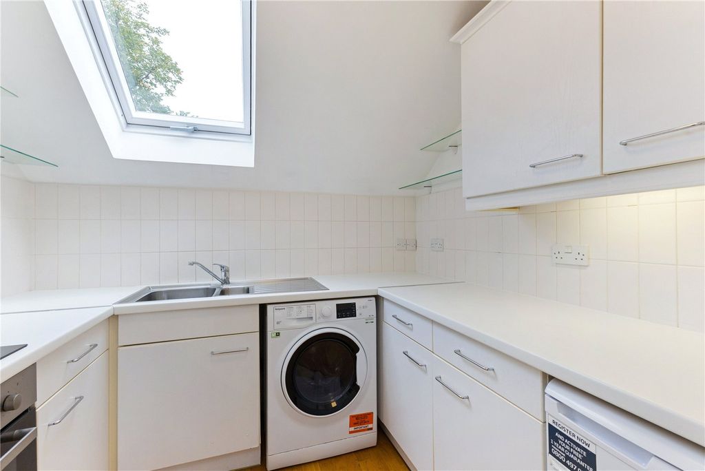 Property photo 3 of 8 Kitchen