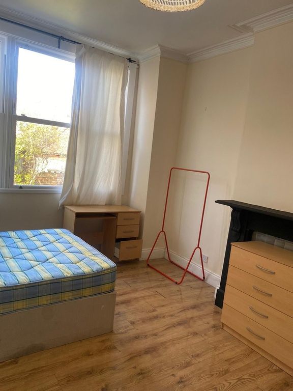 Property photo 3 of 3 Bright Bedroom With Desk And Ample Storage...