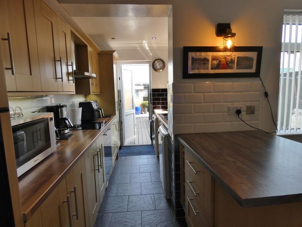 Property photo 2 of 13 Dining Kitchen