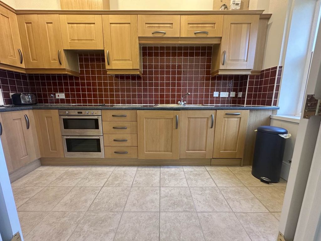 Property photo 2 of 12 Kitchen