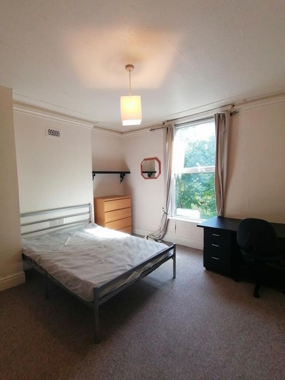 Property photo 2 of 9 Bright And Inviting Double Bedroom Featuring A Spa...